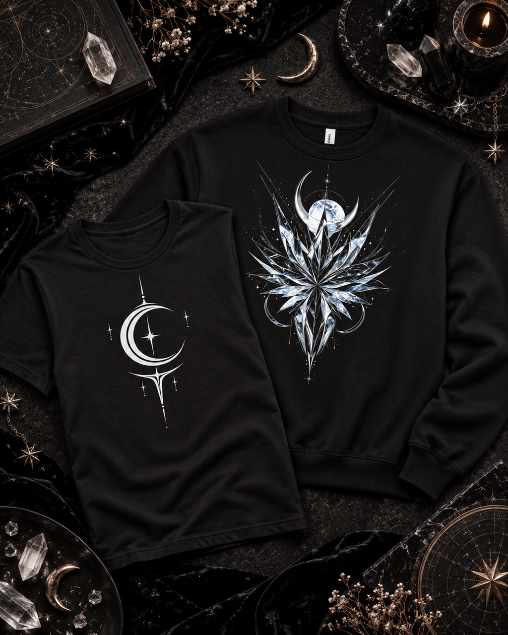 A black crewneck with an icy crystal burst beside a black tee with a white crescent and star.